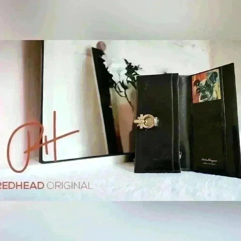 Ferragamo ladies black long wallet-this vintage lady is pre loved & needs a home